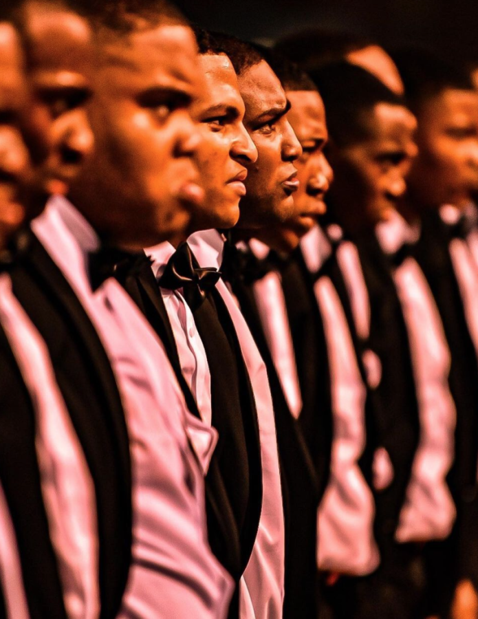 Members of the Alpha Phi Alpha fraternity showcase their group at probate. Photo by Gibran Godfrey.