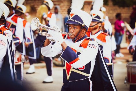 Trumpet player Alex Mackey marches in the Homecoming 2022 Parade in Old Towne Petersburg. Staff photo.