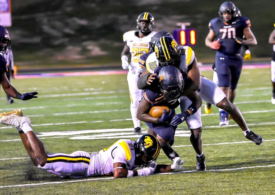 Wide receiver #3 Tylique Ray is finally brought down after a gain of 21 yards in the second half of the Bowie State game during Homecoming Week. 
Photo by Gibran Godfrey. 