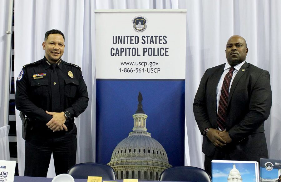 Officer Dareick Barr (left) and Sgt. Tyrone Bond(right) of the United States Capitol Police stand in front of their booth at the “I Have A Dream” Career Expo. The career expo took place at the MPC on Feb. 8 from 10 a.m. to 3 p.m. Students had the chance to meet with over 90+ employers in one location. “We are looking for candidates, and we understand the talent here at Virginia State,” Officer Barr said. “We want to make sure that we have a presence at this career fair to try to offer the opportunities we have with our agency.”