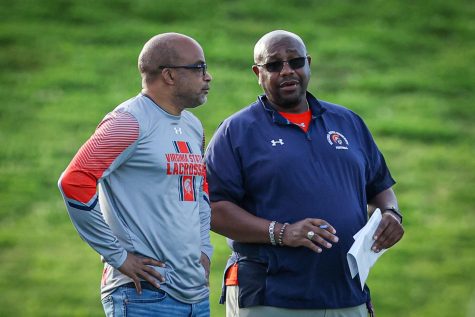 Virginia State University President Makola M. Abdullah, Ph.D. stands next to Head Football Coach Henry Frazier at the Spring Game 2023. Photo by Statesman staff.