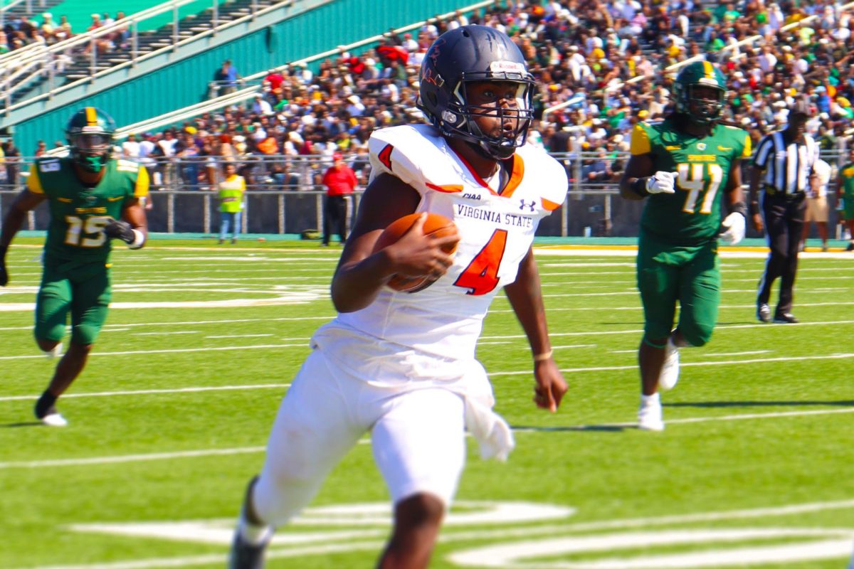 Quarterback Steve Williams breaks out for a long run against Norfolk State on the way to a 33-24 win. Photo by Charnese Small.