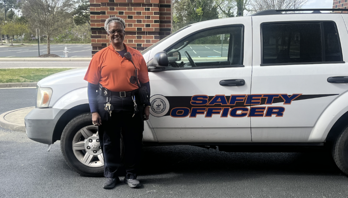 Tina Watkins, Virginia State University fire safety officer/code enforcer                                 stands outside of her work vehicle at VSU on April 10, following the Magic 
City Amusement Day of Fun.
