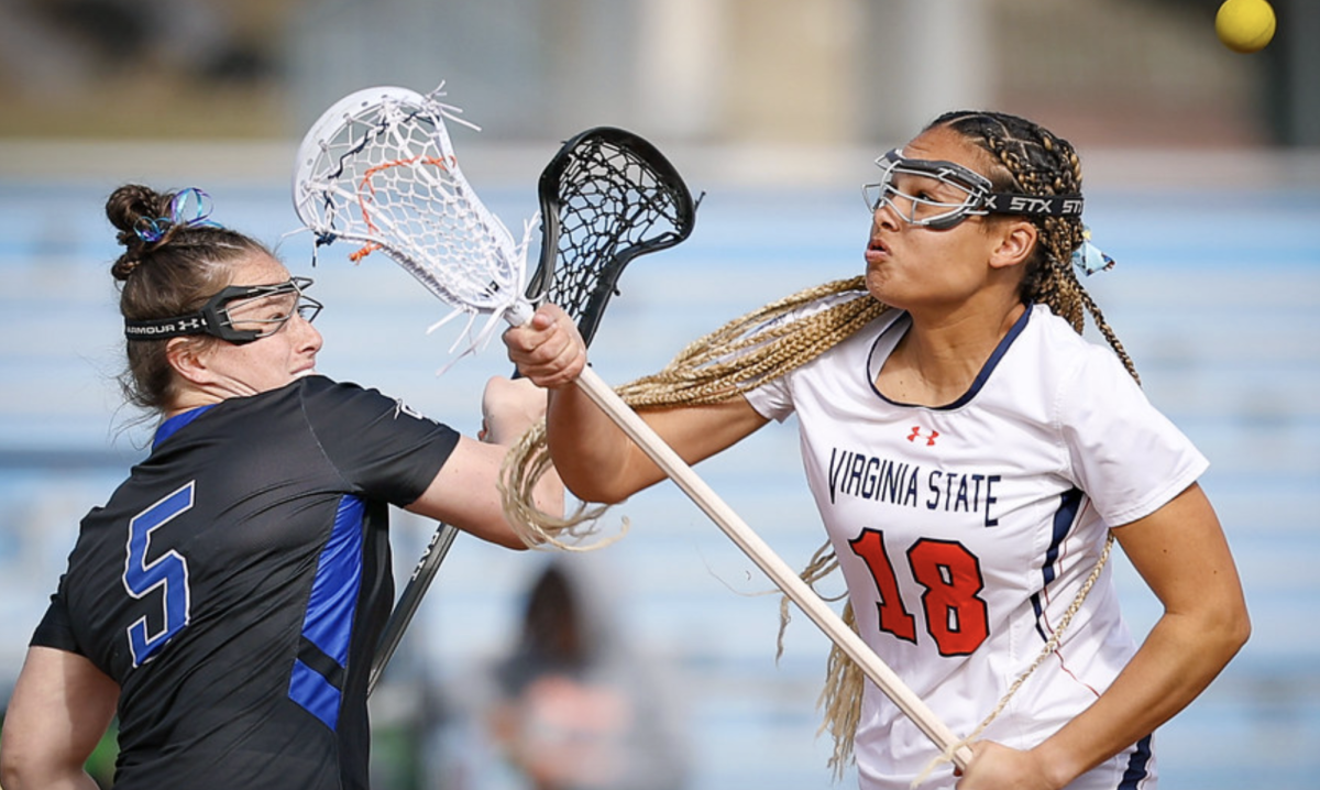 Midfielder Skye Whiting competes in a face-off.