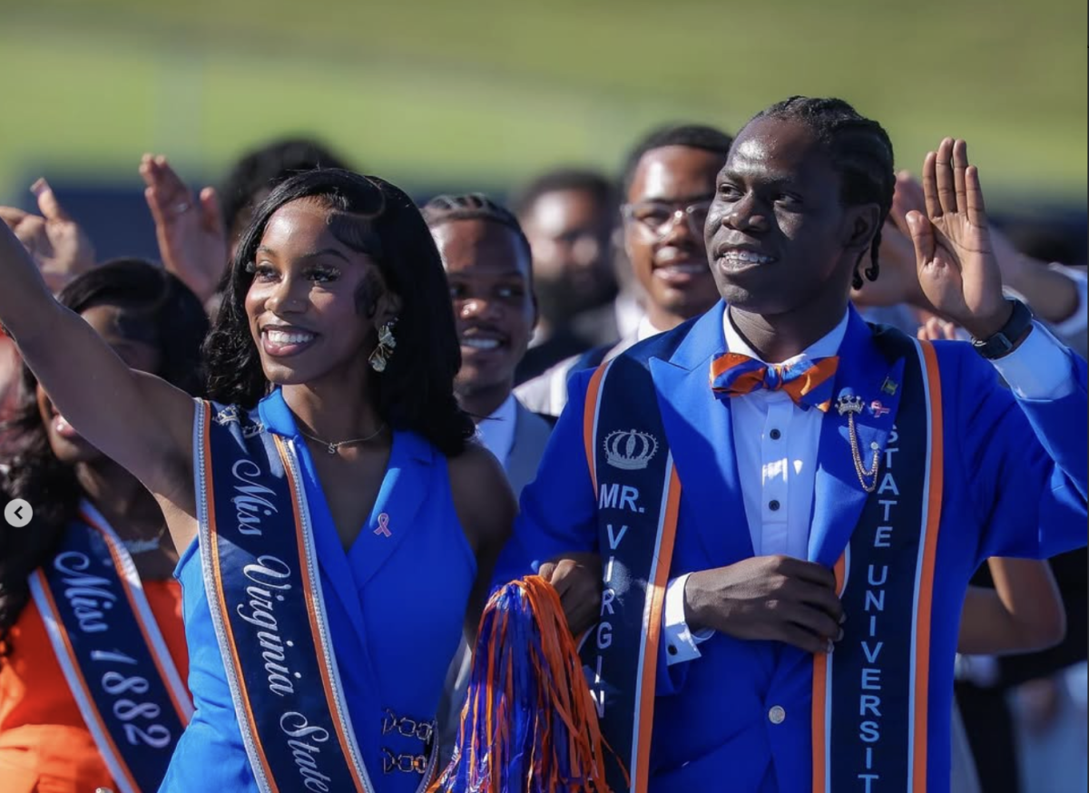 Mister VSU Melvin Cooper, Jr. and Miss VSU Sarai Findlay wave to the crowd at the opening home football game on Oct. 4.