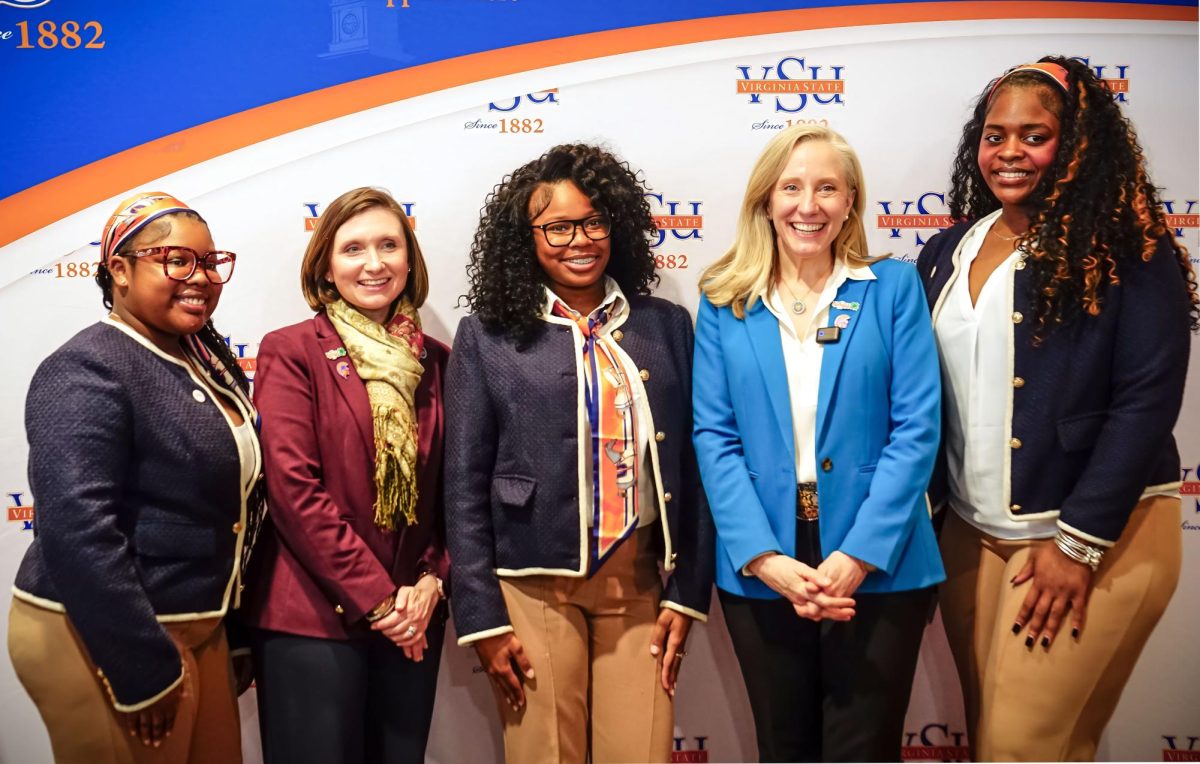 (Left to right) Student Bria Ealy, Secretary of Agriculture & Forestry Katie Frazier, student Alasia Dillard, Governor Abigail Spanberger, and student Khadijah Thomas take a photo during the Governor’s visit to the Multipurpose Center. 
