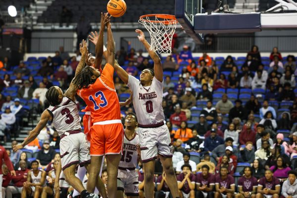 Senior forward Jared White attacks the rim against Virginia Union University during the last home game of the regular season. White totaled 184 points for the 2025-2026 season and had his best game against Delaware State where he scored 19 points.