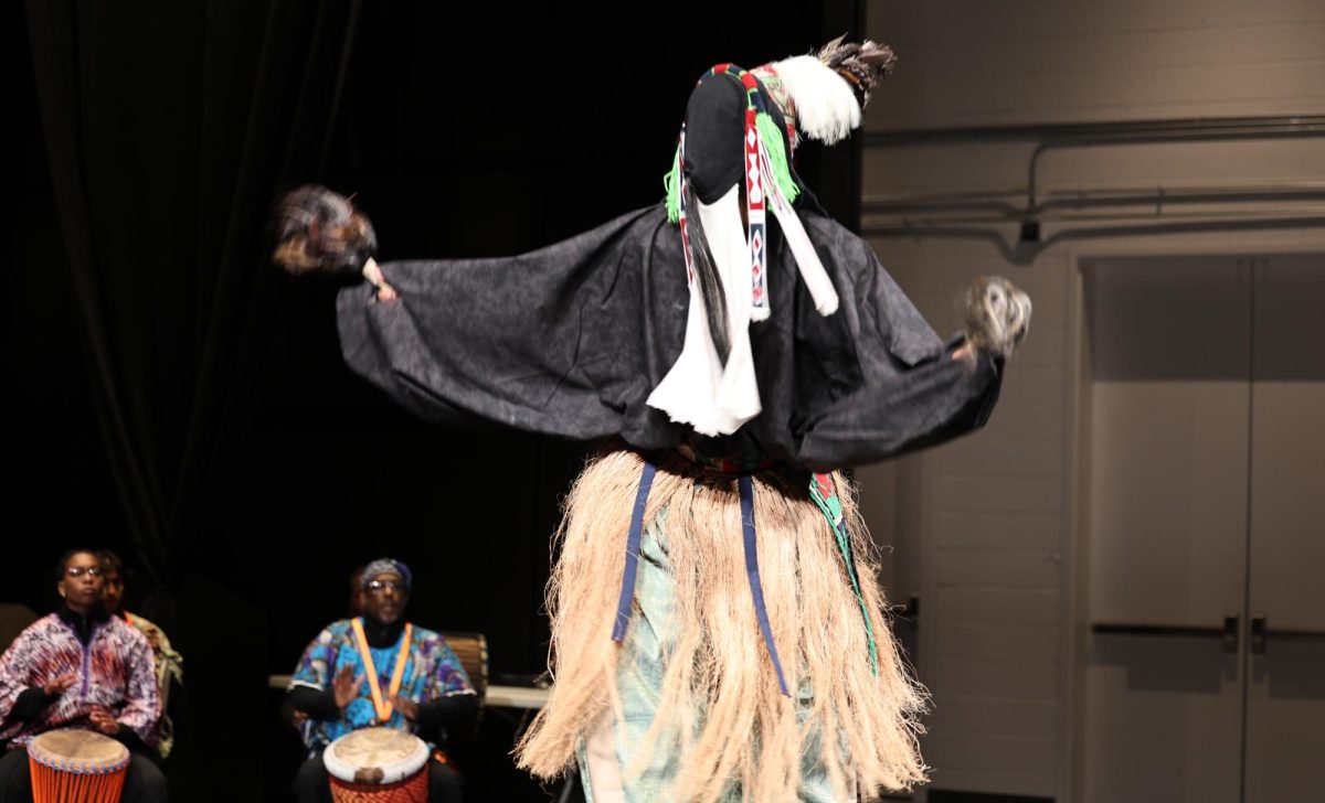 The Trojan Alliance Performing Arts or TAPA’s djembe drum battery, accompanied by a stilt walker, kicks off the theater takeover in the new Alfred Harris Academic Commons. 