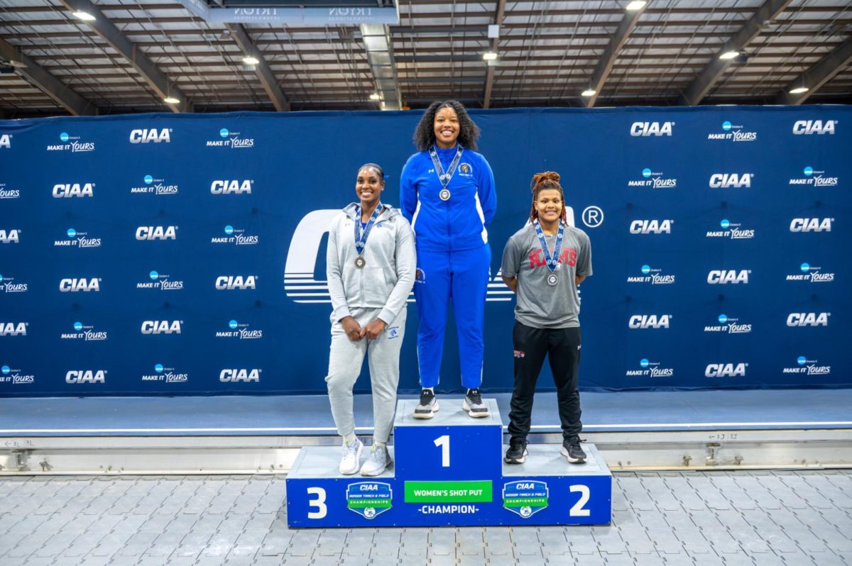 Senior Janiya Harmon stands atop the podium at the CIAA Indoor Championships in February 2026. Harmon won first place in shot put with a throw of 13.72 meters. 
Photo by CIAA Photographers.